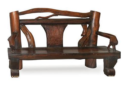 A Pair of Log Benches Height 48 x width 75 x depth 28 inches.