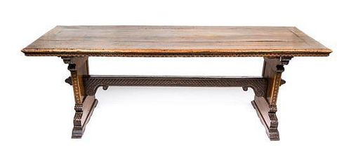An English Jacobean Style Oak and Walnut Trestle Table Height 32 x width 92 1/2 x depth 31 inches.