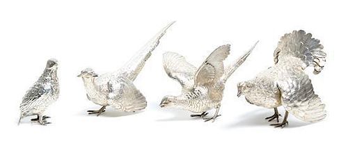 Four Silver Birds Figurines Largest height 5 3/4 x width 5 x depth 6 1/2 inches.