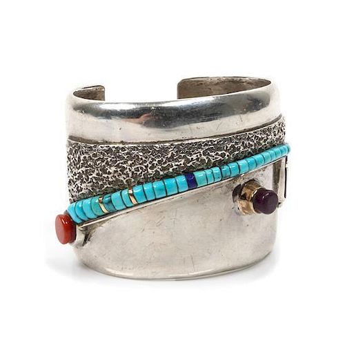 A Hopi Domed Silver and Multi-Stone Cuff Bracelet, Charles Loloma Length 5 1/4 x opening 7/8 x width 1 7/8 inches.