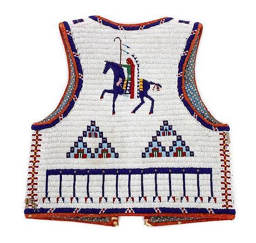 A Lakota Pictorial Beaded Vest Height 20 1/4 x width 18 1/2 inches.