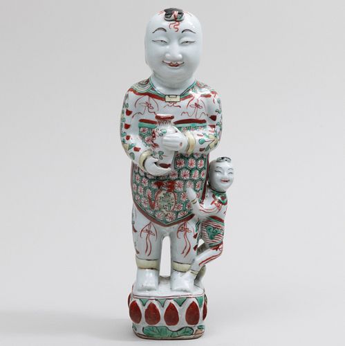 Chinese Wucai Decorated Porcelain Figure of a Boy