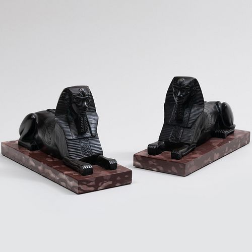 Pair of Patinated-Metal Models of Recumbent Sphinxes on Marble Bases 