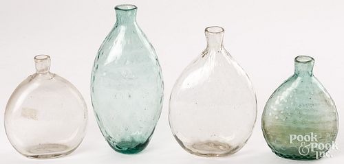 Four blown glass flasks, 19th c.
