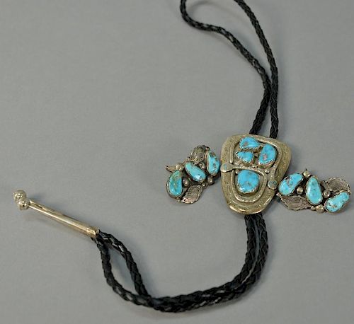 Three piece silver set with lariat and pair of cufflinks, each set with turquoise.