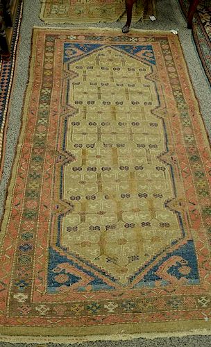 Oriental throw rug (worn) 4' x 7'.