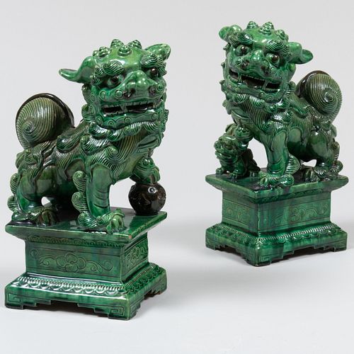 Pair of Chinese Green Glazed Pottery Buddhistic Lions