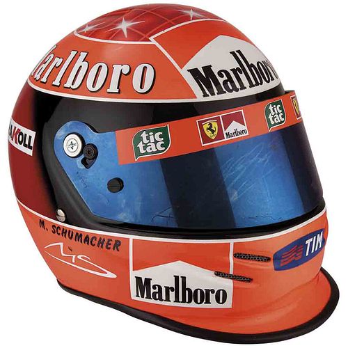 MICHAEL SCHUMACHER DISPLAY HELMET FERRARI F1 RACING TEAM 2000. Con la firma de Michael Schumacher en la visera.