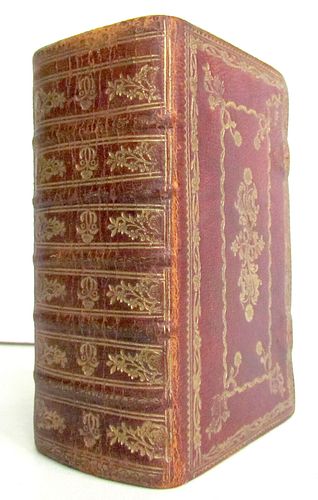 BIBLE IN DUTCH DECORATIVE BINDING FROM 1741, FEATURING BOTH OLD AND NEW TESTAMENTS
