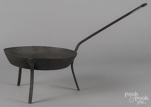 Wrought iron skillet, 19th c., stamped Foster, 30 1/2'' l.