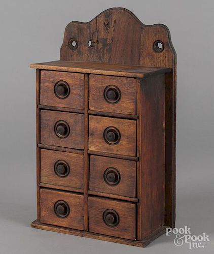 Pine and walnut hanging spice cabinet, late 19th c., 17 1/4'' h., 10 1/2'' w.