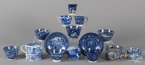 Group of blue Staffordshire cups, saucers and mugs.