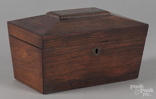 Regency rosewood tea caddy, ca. 1820, with a fitted interior, 5 1/4'' h., 9'' w.