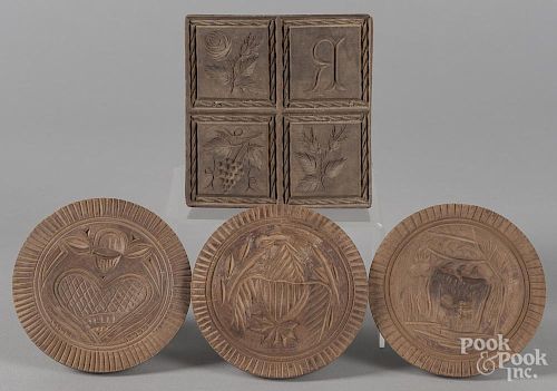 Four carved butterprints, 20th c., to include an eagle example.