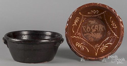 Two redware bowls, 19th c., 5'' h., 11 3/4'' dia. and 4'' h., 11 1/2'' dia.