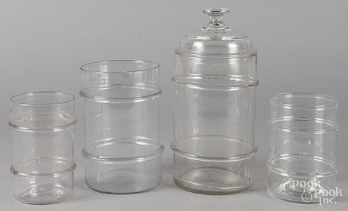 Four blown glass canisters, 19th c., tallest - 11 3/4''.