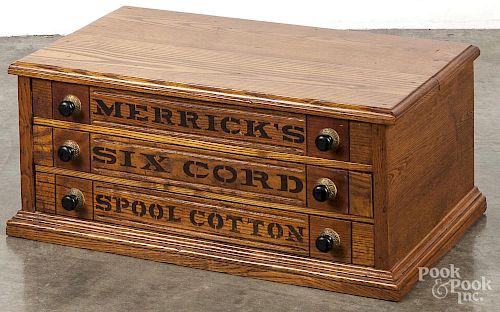 Merrick's oak spool cabinet, 10 1/4'' h., 24 1/2'' w.