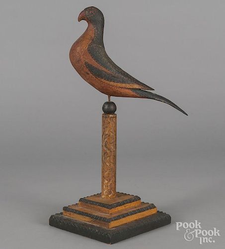 Carved and polychrome decorated bird, 20th c., 18'' h.
