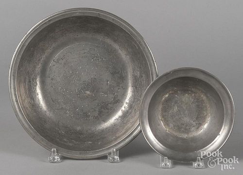 Two pewter basins, 19th c., the larger marked London, 2 1/2'' h., 10 1/2'' w. and 2'' h., 6 1/2'' w.
