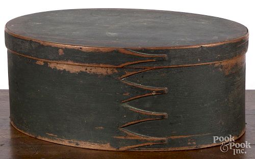 Shaker painted bentwood box, 19th c., retaining an old green surface, 5 1/2'' h., 13 1/4'' w.