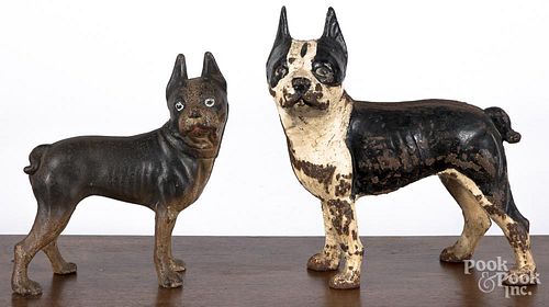 Two cast iron terrier doorstops, ca. 1900, 8 1/2''h. and 10 1/4'' h.