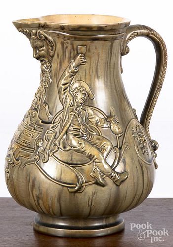 German molded pottery pitcher, ca. 1900, 9 1/4'' h.