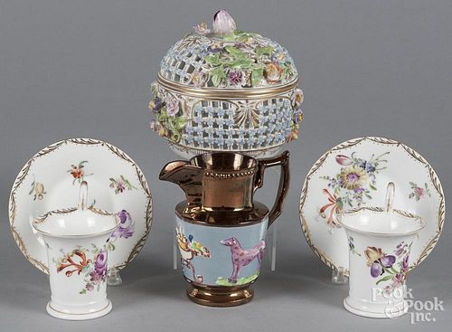 Meissen reticulated bowl and cover, together with two cups and saucers and a luster pitcher.