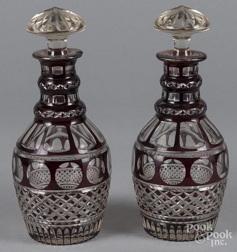 Pair of ruby cut to clear glass decanters, 11 3/4'' h.