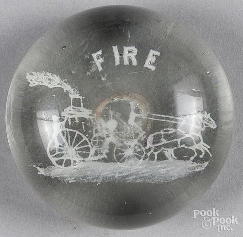 Frit paperweight, attributed to Michael Kane, with a horse drawn fire wagon, inscribed Fire, 3'' di