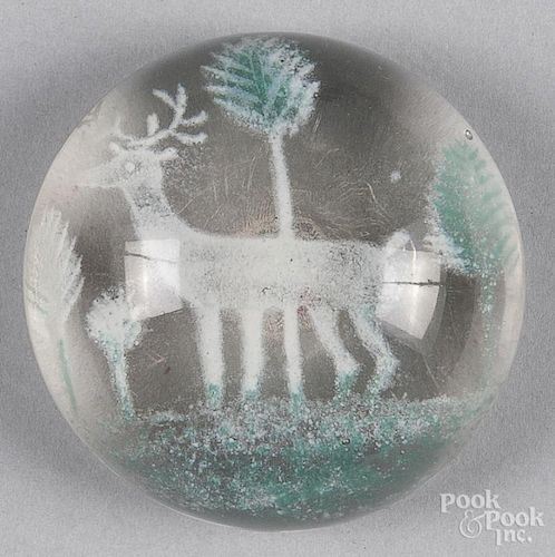 Frit paperweight, attributed to Michael Kane, with a white deer and green trees and grass, 3 1/8'' di
