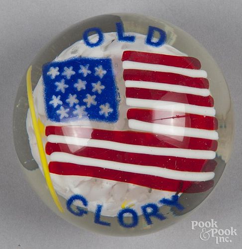 American Old Glory paperweight, with a flag over a white chipped base, 3 1/2'' dia.