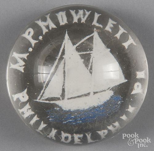 Two colored frit paperweight, with a two-masted sailing ship, inscribed M. P. Howlett Philadelphia