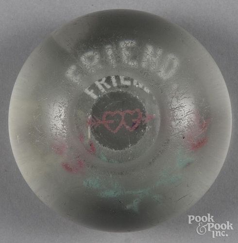 Three colored frit paperweight, with two hearts and an arrow, inscribed Friend with top facet, 3 1
