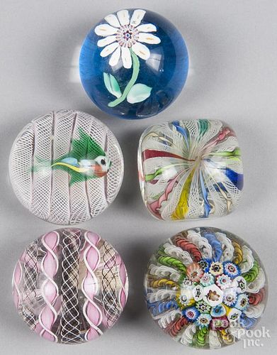 Five Murano paperweights, to include a fish, a flower, and some with twisted ribbons, largest - 3 1/