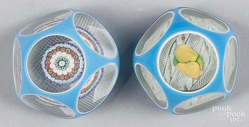 Two Murano turquoise double overlay paperweights, one with a millefiori circle, 3 1/4'' dia., the sec