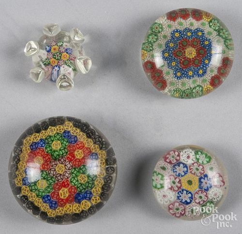 Four Chinese millefiori paperweights, to include a small brush rest, largest - 3 1/2'' dia.