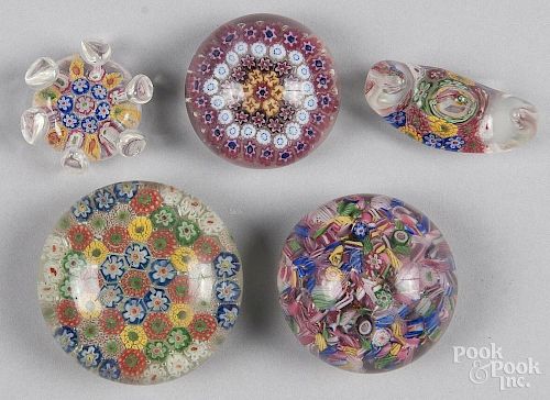 Five Chinese millefiori paperweights, ca. 1920, to include a brush rest, and a chopstick holder, lar