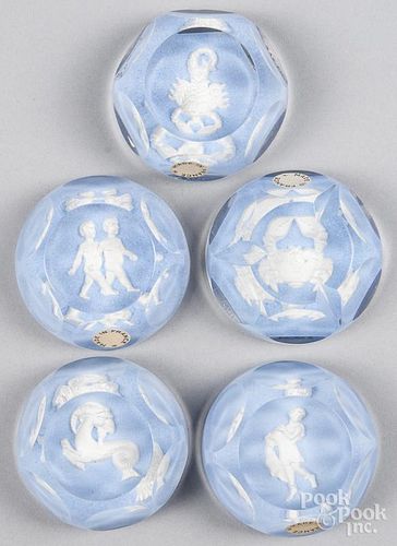 Five Baccarat Zodiac sulfide paperweights, faceted, to include Aquarius, Gemini, Scorpio, Cancer, an