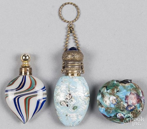 Venetian glass perfume bottle, with portrait canes on a turquoise and silver ground, with a brass to