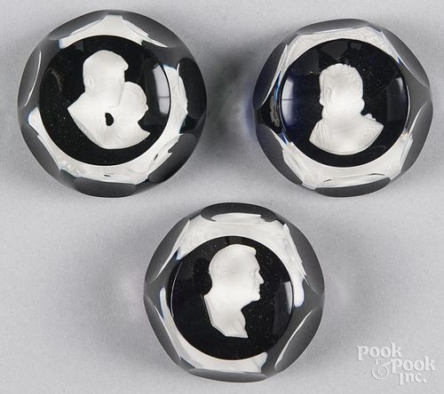 Three Christian D'Albret sulfide faceted paperweights, with historical figures on dark grounds, to i