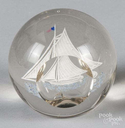 Millville, New Jersey multicolored frit paperweight, with an upright sailboat and side facets, 3 1/2