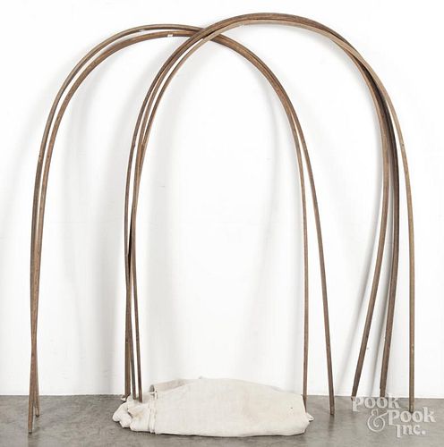 Conestoga wagon hoops, 19th c., with a canvas cover, hoops - 64'' h.