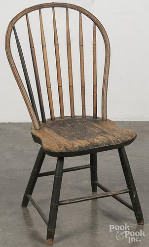Pennsylvania painted hoopback Windsor chair, 19th c., retaining an old green surface.