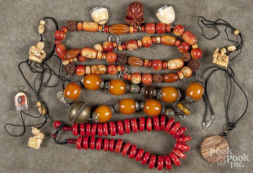 Group of Asian semi - precious stone necklaces, late 19th c., to include examples with coral, bone,