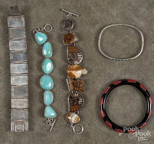 Assorted bracelets, to include a Mexican silver and black stone bracelet, a sterling silver and turq