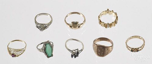 Six gold rings, from 10K - 14K, to include one with two small sapphires and a diamond, one with a si