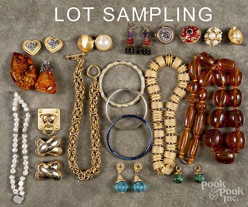 Large group of costume jewelry, to include multiple pairs of earrings, bracelets, necklaces, brooche