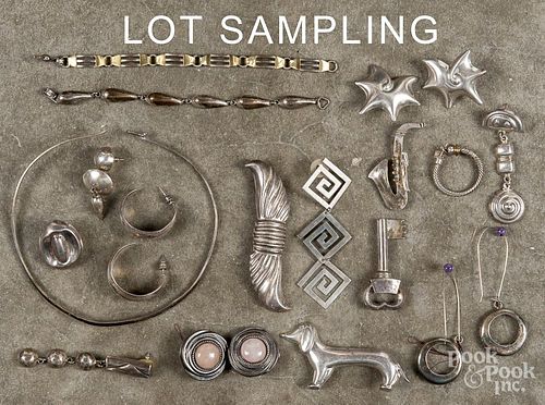 Collection of sterling silver jewelry, to include earrings, brooches, necklaces, and bracelets, 16.3