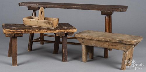 Group of woodenware, 19th c., to include three primitive benches, a divided carry tray and a churn,