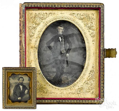 Large tin type of a gentleman in a book - form case with mother - of - pearl ornamentation, 6 3/8'' h